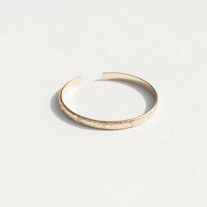 Giftable! 6.5" 18K Gold Plated Our Spare Change floral textured wire cuff